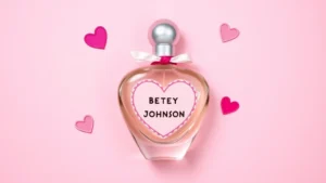 betsey johnson cologne - Flat lay of Betsey Johnson cologne bottle with heart-shaped design elements and