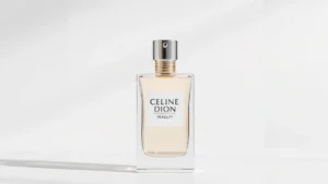 celine dion fragrance - Elegant Celine Dion fragrance bottle against soft white background with subtle s