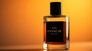 coach black cologne - Close-up of Coach Black Cologne bottle with warm lighting showing rich amber liq